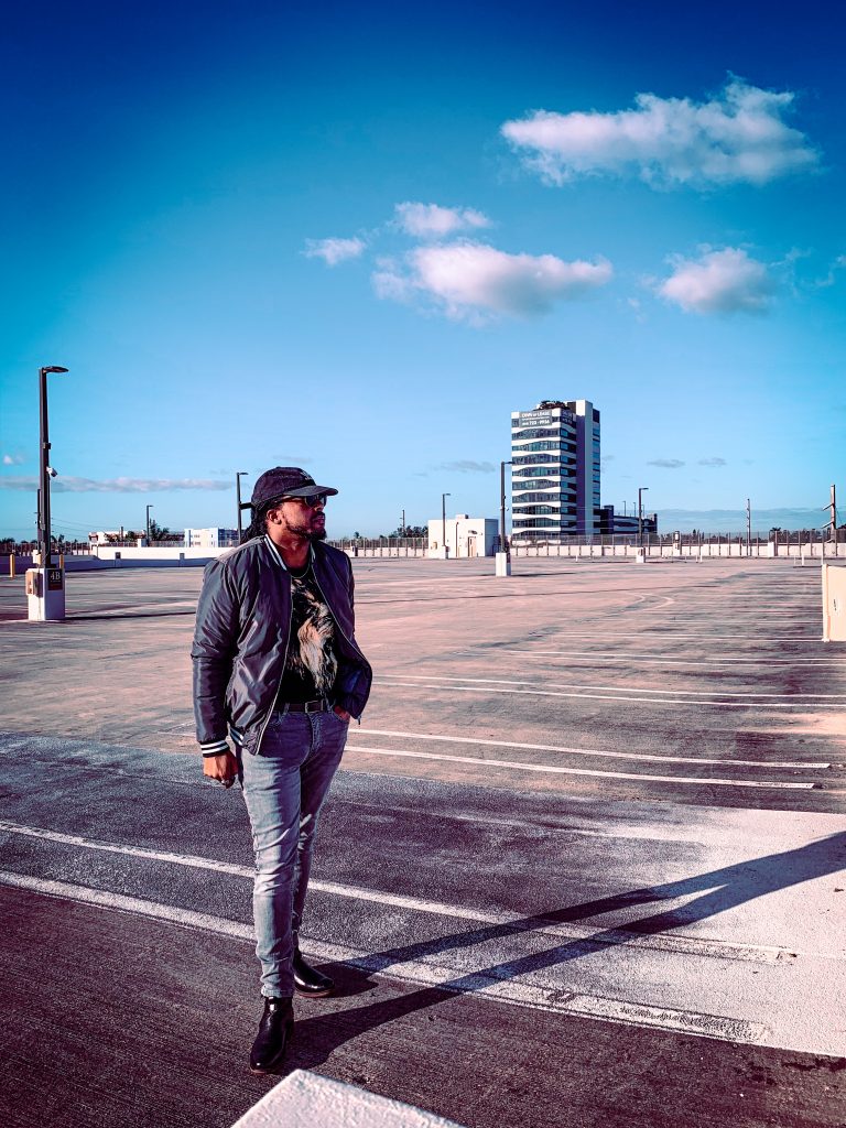 grey bomber jacket, grey denim, black lion t shirt. 7 different ways to style Jodhpur boots!